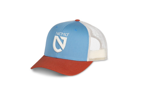 Blue and white snapback cap featuring a red brim and 
